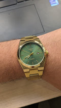 Elegant Tissot Gold-Tone Quartz Watch with Green Dial