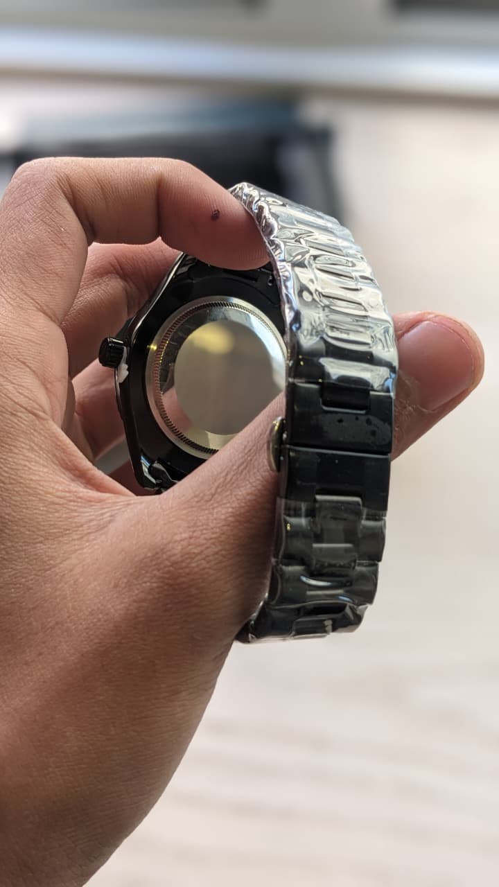 Rolex Datejust with a fluted bezel date window and fully diamond-style dial